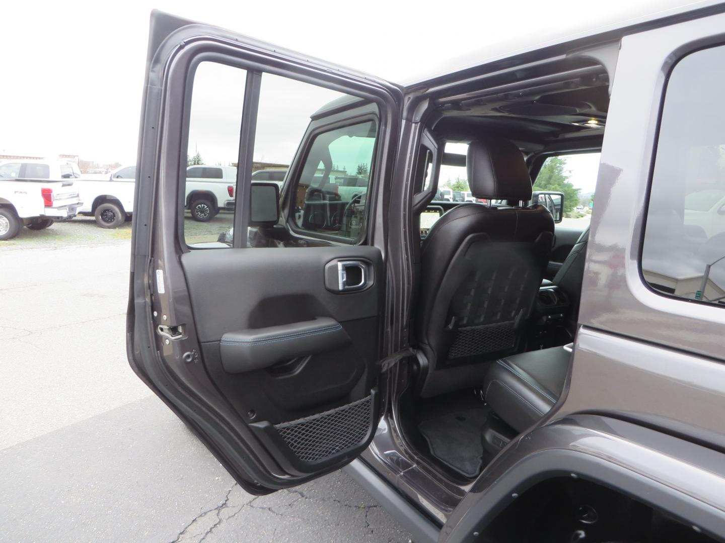 2021 CHARCOAL /BLACK Jeep Wrangler Unlimited Rubicon 4XE 4d SUV 4wd (1C4JJXR60MW) with an 2.0L L4 DOHC 16V TURBO engine, automatic transmission, located at 2630 Grass Valley Highway, Auburn, CA, 95603, (530) 508-5100, 38.937893, -121.095482 - 4XE Rubicon sitting on a Zone offroad suspension system, Fox shocks, 37" Toyo RT trail tires, 17" Method Race wheels, Teraflex Hd tire carrier, and Flat tow ready. - Photo#38